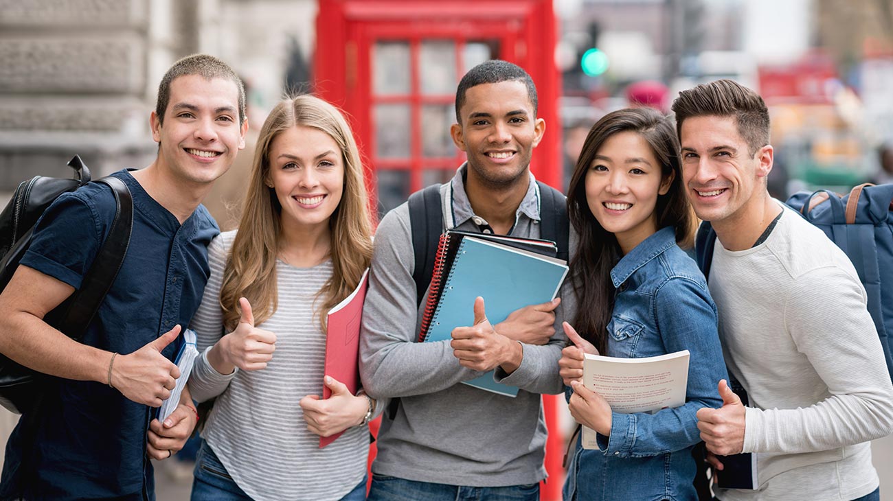 picture of students holding books